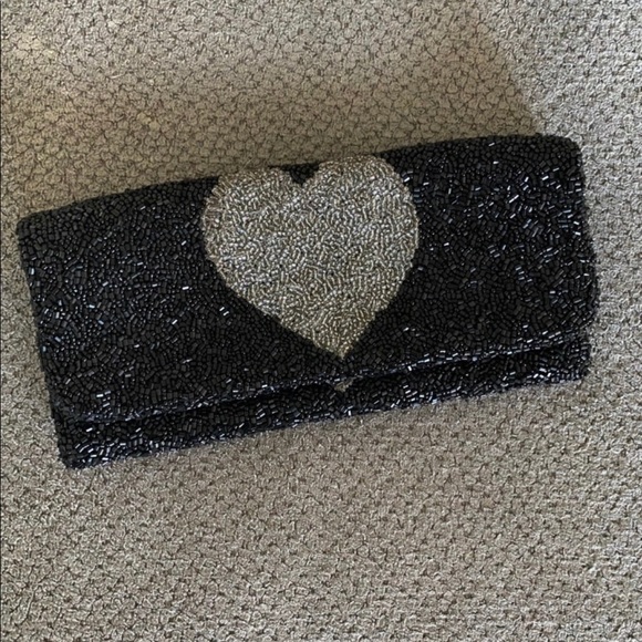 Moyna Handbags - Moyna Black Embossed black/ silver clutch